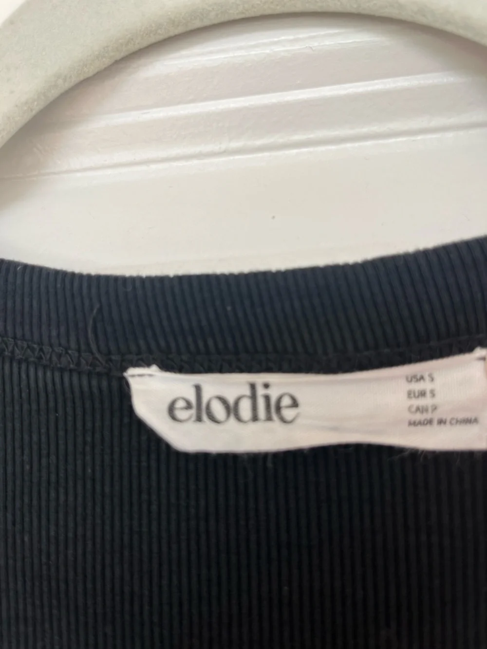 Elodie Black Long-Sleeve Scoop Neck Bodysuit with Snap Hem